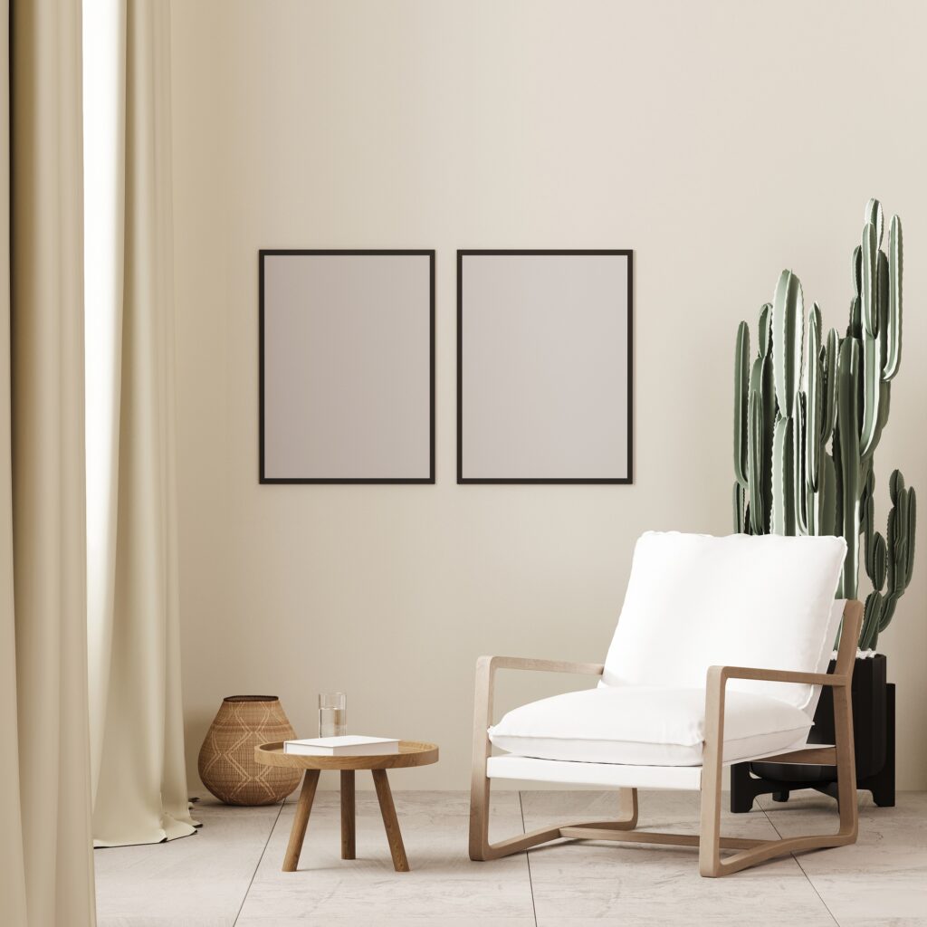 two poster frame mock up in boho style interior background with white armchair and coffee table, 3d