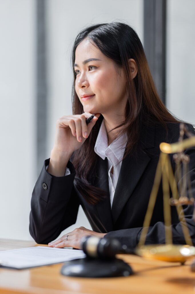 female business woman lawyers working at the law firms. Judge gavel with scales of justice. Legal