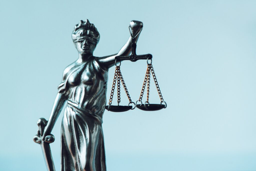 Lady Justice statue in law firm office
