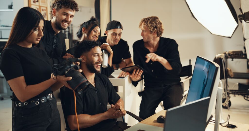 People, happy or backstage for photography or teamwork for production results, planning or review.